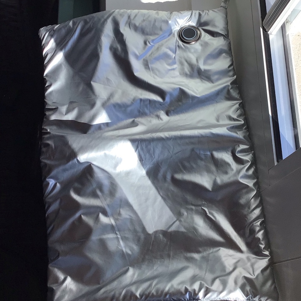 Electric heating pad, about 15 inches long. Need a power bank to power it.